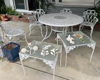 Large vintage wrought table with 4 chairs & umbrella stand, two vintage wrought iron side tables with lass tops 
