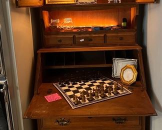 Inside of secretary's desk with lights, picture frames, 19th century chess set & more