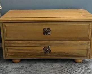 Right chest of drawers: may be used as a nightstand or bench with storage for shoes and other items.. (We have two matching chests.)