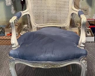 Vintage armchair with blue cushion