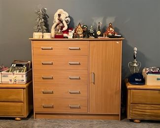 Two long hardwood nightstands that can also be used as benches with storage. One chest of drawers in center.