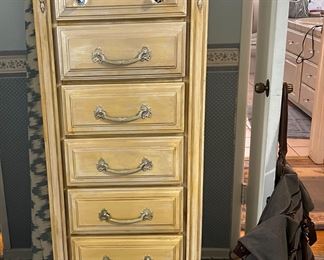 Roll of material, tall hardwood dresser & new Greg Norman bag with tags attached