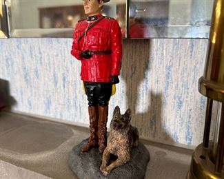 Nature's Window resin figurine of Canadian Mounty and dog canine 8"H