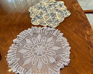 Crocheted doilies, largest is 16"