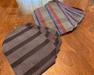 Group of grey and multi-color stripe placemats