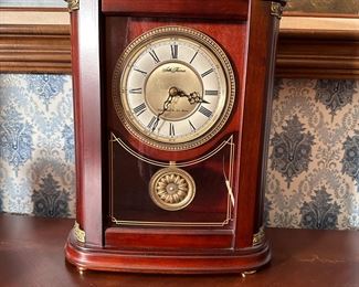Battery-operated Seth Thomas clock with oval case and plays Westminster & Ave Maria chimes 14"H x 10"W