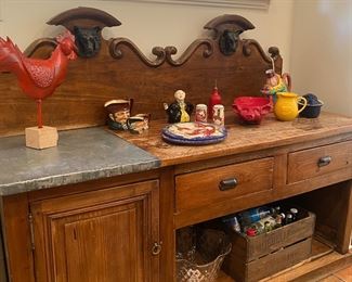 Fantastic French butcher table with iron animal mounts. Bought at Gay Wirth Antiques