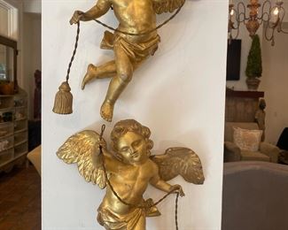 Pair of gold cherubs