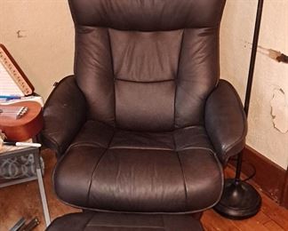 Fords leather chair and foot stool