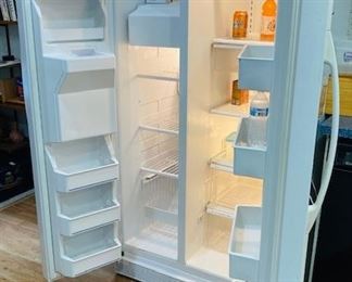 Whirlpool Side by Side Refrigerator/Freezer.