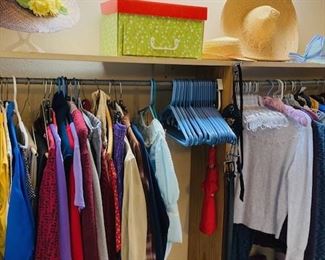Large Selection of Top Condition Women's Clothing, Shoes, Hats, Purses and Accessories.