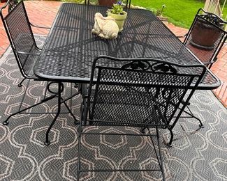 Wrought iron patio table and chairs