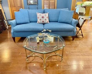 a high end feel, pristine upholstery and a nice firm but cushion-y seat sofa. Great brass and glass MC coffee table, which also has a matching side table available