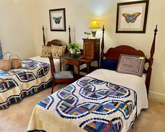 a pair of mahogany poster beds