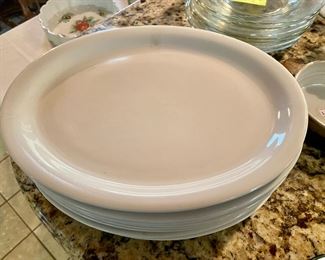 set of oval white plates
