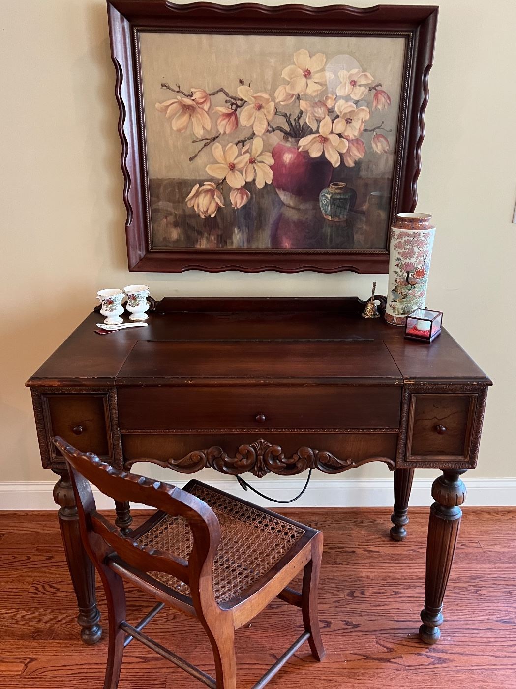 Antique writing desk and rattan chair