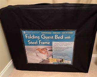 Folding guest bed
