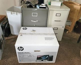 HP tower PC and monitor. File cabinets