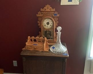 Sewing cabinet with Free brand machine inside
Glove box and kitchen clock