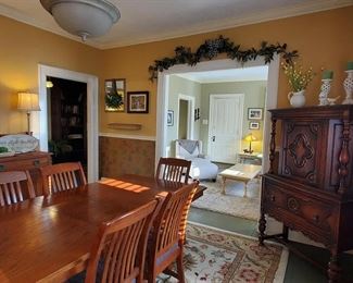 Beautiful dining table and buffet, antique cabinet, clock