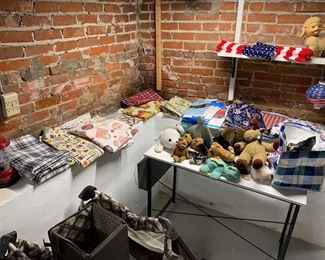 Stuffed animals, camping crib, table cloths, 4th of July items, nice white crafting table