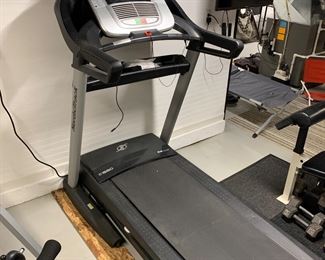 The C 1650 Treadmill is in the running as one of NordicTrack’s top models with great design paired with a ton of features. Starting with the construction, this home treadmill has a sturdy, stable foundation and is powered by a strong 3.5 continuous horse power motor. This motor allows a maximum running speed of 12 mph (that’s fast) and a maximum incline of 12%. The 1.9” rollers for the belt are high quality with sealed bearings. The NordicTrack C 1650’s running surface itself utilizes a FlexSelect cushioning system that will take all of the stress off of your knees and ankles. However, if you prefer running on a stiffer surface, the FlexSelect system can also provide that.
The NordicTrack C 1650 Treadmill’s add-ons will keep you coming back for more. The console on this treadmill is packed with 34 programmed workouts and is iFit compatible. These means a whole library of workouts are at your fingertips as well as the ability to compete against friends and the ability to track your exer