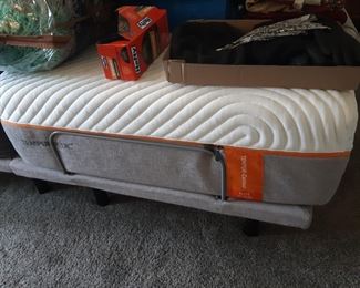 King made of two twins, one is Tempurpedic,  the other is not.