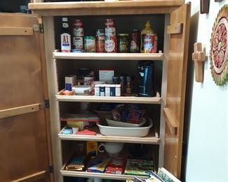 Kitchen, food items and cookbooks.