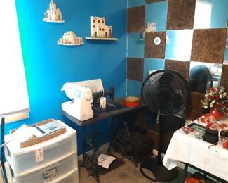 New Home antique treadle sewing machine,  and newer Brother sewing machine 