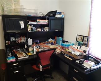 Black desk, pink office chair (2 available), first bedroom on the right.   Lots of office supplies.  Folders, printer paper, pens/pencils, tape and more!