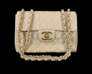 These pre-owned items are in excellent condition and high demand.  Above is a Chanel beige quilted lambskin leather jumbo double flap bag with gold hardware  in excellent condition.  