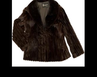 Sassy "Black Fantasy" dark mink jacket with black leather piping from Kreegers, New Orleans