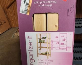 solid pine shelving still in the box, have 2 sets. 