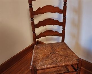 one of two Ladder back chairs