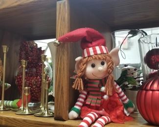 smaller Christmas elves plus a large variety of Christmas ornaments and decorative pieces.