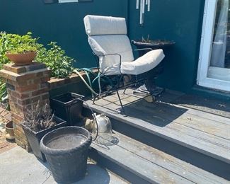 Lots of wrought iron furniture 