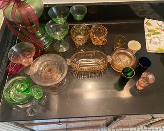 Many pieces of depression glass