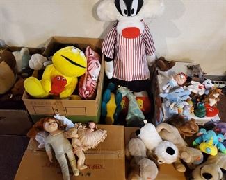 Variety of Stuffed Animals and Dolls