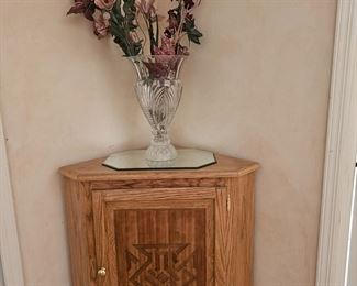 Crystal vase and corner handmade wood unit