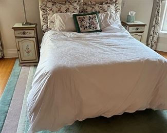 Rosevera Cream colored tufted bed.