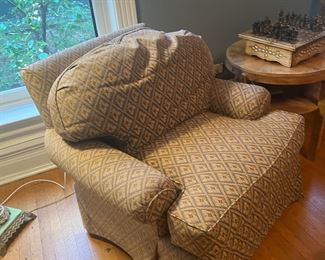 Two Skirted club chair and ottoman upholstered in beige and taupe chenille in a geometric pattern with one ottoman 