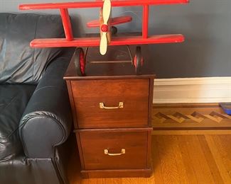 Brown wooden filing cabinet, Myrtlewood biplane, 