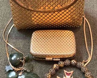 Small clutch, jewelry and Mirror