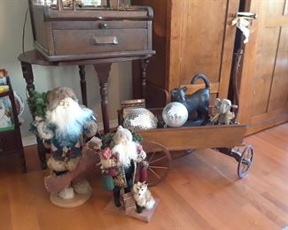 Two Lynn Haney Santa Claus, disco balls, vintage style wagon, interesting display piece in upper back.