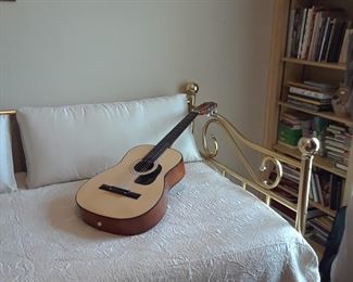 Beginner's Guitar and floor stand. Trundle daybed.