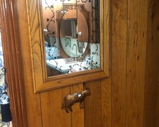 Mirror in an oak frame.  Copper cow