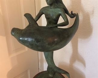 Paul Baliker local artist, bronze 21 1/2" tall. Circa 1980's. Mermaid w/manatee.
