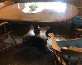 Ethan Allen dining room table with two leaves and four chairs