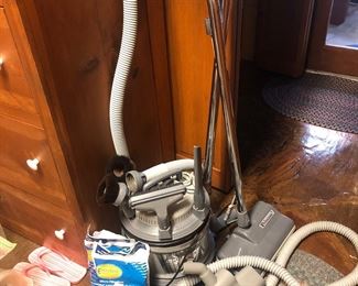 Complete, Vintage Princess II canister vacuum cleaning system with hoses, lots of attachments and filters