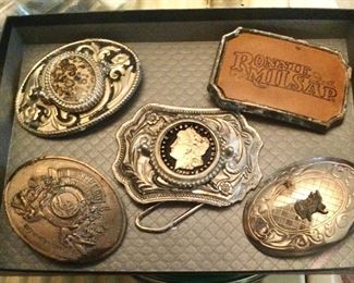 Lots of fine belt buckles